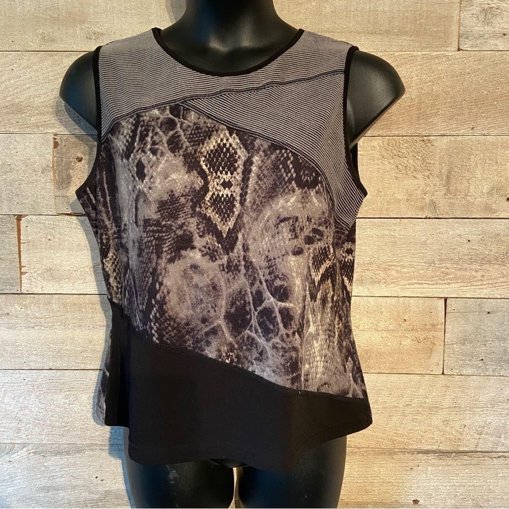 Vivian Wong women's asymmetrical cut blouse in size x-large